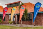 tahatai school display flags printed in house colours