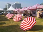 striped gazebos with umbrellas